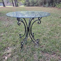 Round glass top table