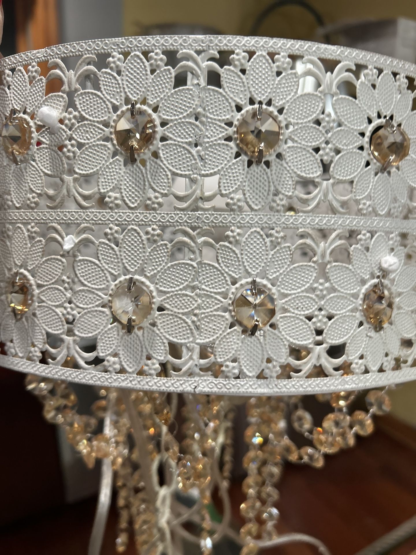 NEW JUST OUT OF THE BOX GORGEOUS LAMP WITH CRYSTALS HANGING FROM A WHITE DESIGNER HANGING LAMP