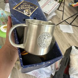 Overview    +7 The image shows an Antique Selangor Pewter 977 collectible babies first handled cup. 