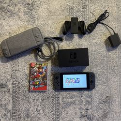 Nintendo Switch w/ Case & Mario Odyssey