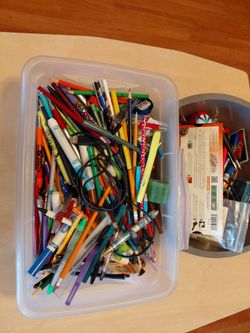 Assorted pencils, pens, etc.