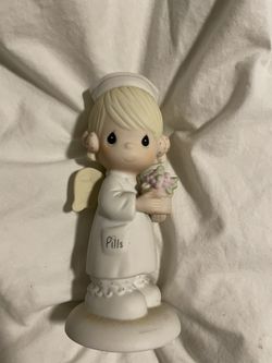 Precious Moments Angel of Mercy (Collectible)