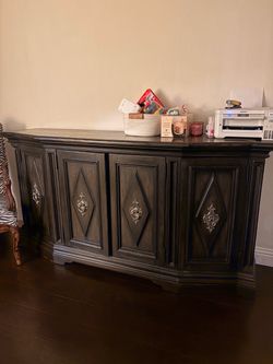 Glass metal table, brown book cabinet, blueish gray living room cabinets