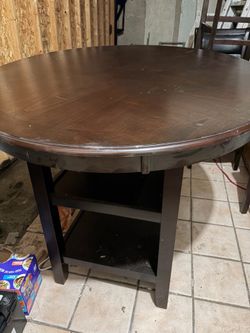 $150 wood round table
