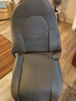 Brand New. VEHICLE SEAT COVER for front sea bra.\nNd new never used gray colored Vehicle Seat Covers