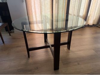 Round glass table with 4 chairs. Get it tonight for $150