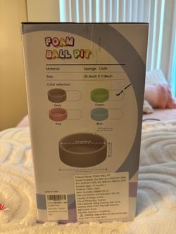 Foam ball pit with a bag of balls
