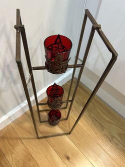 Three-tier metal floor candle 