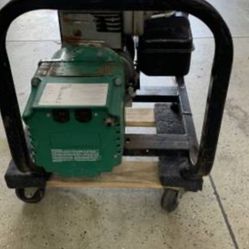 he image shows a Coleman Powermate 4000-watt portable generator. Here's so