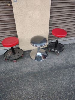 3 stools (2 with wheels) - about 14 inches tall