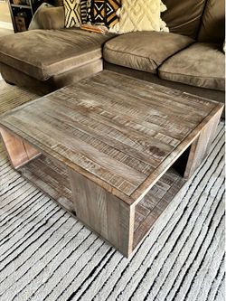 Square reclines wood coffee table with storage from Living Spaces with casters
