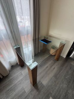 Modern Glass Dining Table – Solid Wood Legs – Great Condition – $90