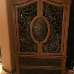 Vintage and crafted entertainment armoire