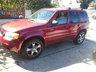 Ford escape 2006 car runs great salvage title tags good into August of this year only 133.000 miles I I'm using this car to be a lyft driver