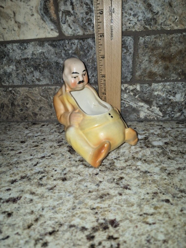 Vintage Porcelain Fat Man Sitting Pipe Holder