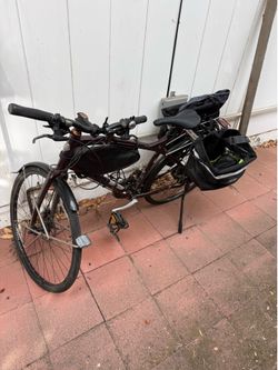 Bike with all gear but one tire needs replacing