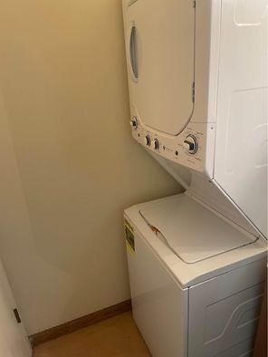 GE Electric Stacked Laundry Center Washer And Dryer