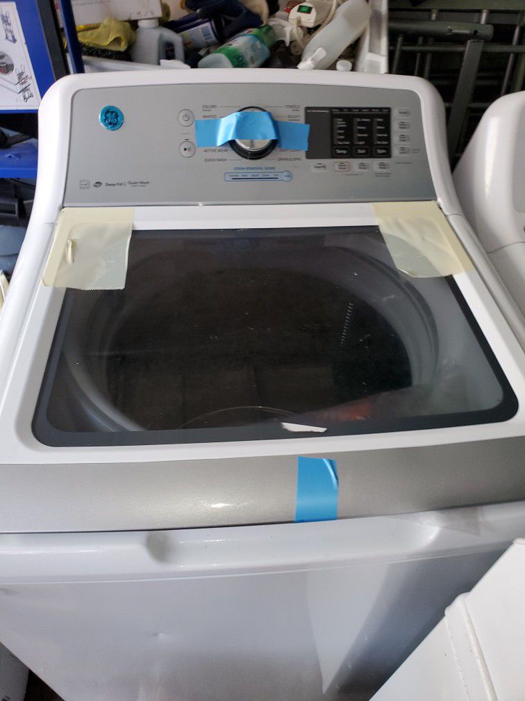 washer machine GE open box new ..never use 90 days warranty...$475