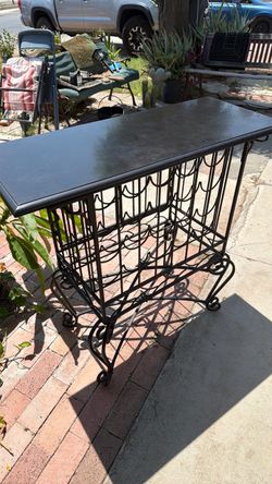 Iron Wine table with granite top