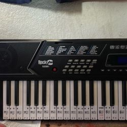 Piano With Stand And Chair 