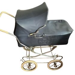 "Vintage navy blue baby carriage with white wheels. Classic and charming!