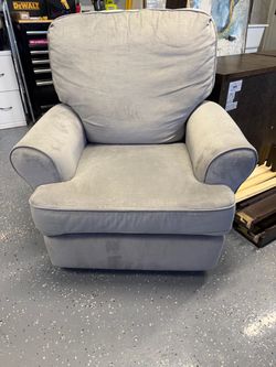 Grey microfiber, swivel recliner.
