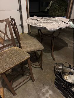 Free table and chairs! Very nice. Moving