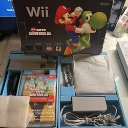 Nintendo Wii + New Super Mario Bros. Wii