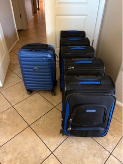 6 Carry on suitcases