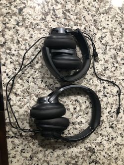 2 Pairs Of Black Soundcore Headphones 