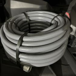 RYOBI pressure washer and water hose