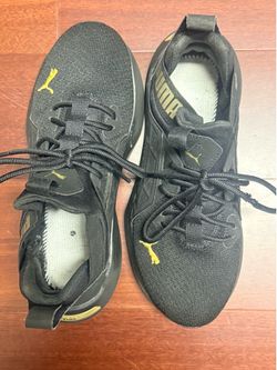 Puma black sneakers