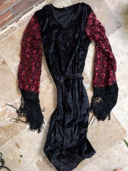 Size large girls costume dress with fringes on the sleeves