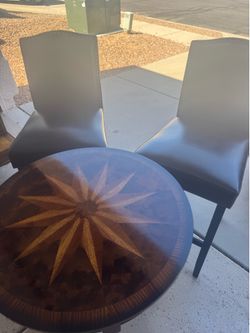 Round starburst inlay pub table with 2 barstools