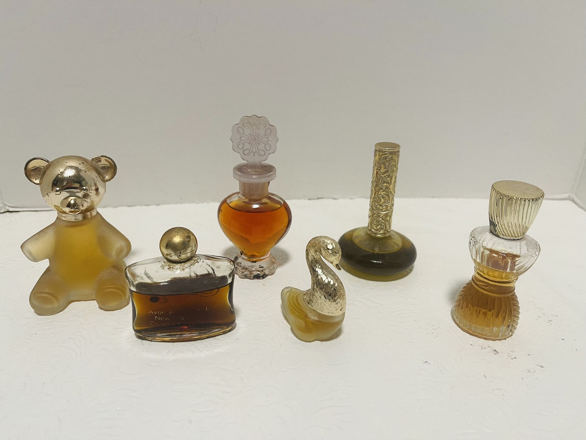 Vtg AVON Occur,Rapture, Honesty Cologne, Swan, Snowflake, Moonwind Perfume,