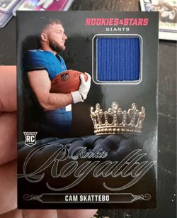 2025 Panini Rookies & Stars Rookie Royalty Memorabilia card of Cam Skattebo.