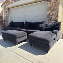 Gray Sectional With Chaise, Ottoman And Accent Pillows