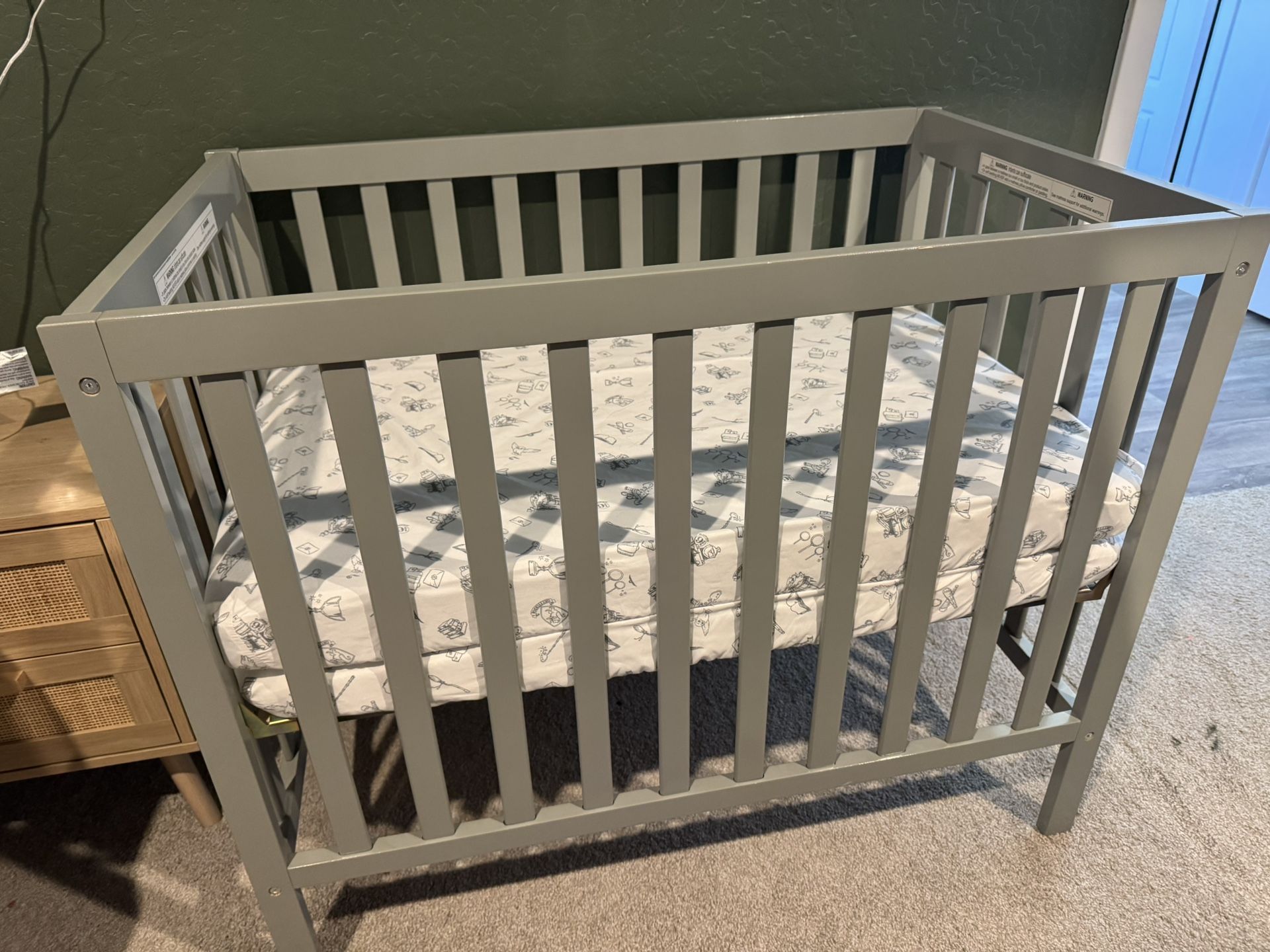 BRAND NEW GRAY CONVERTIBLE MINI CRIB & MATTRESS