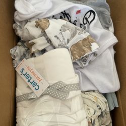 3 Boxes Of Baby Clothes 