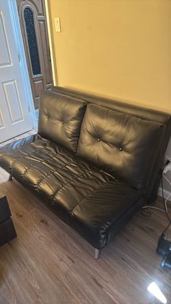 Black faux leather futon