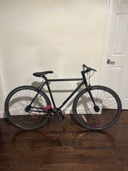 Fixie bike red grip pedals