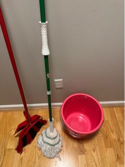 A mop with a bucket and a dustpan with a broom, all for $10