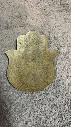 Copper hamsa table center piece for evil eye.