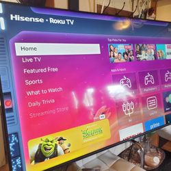 75" hisiense roku smart tv 4k great condition like new come with wall mount set.  Great Quality Pic 