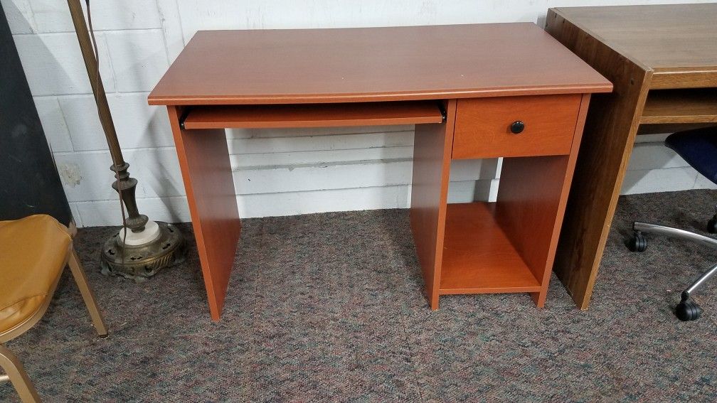 Small desk with pull out shelf and drawer