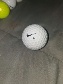 Over 100 golf balls some new some barely used