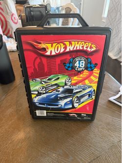 2 Hot wheels cases one filled with cars