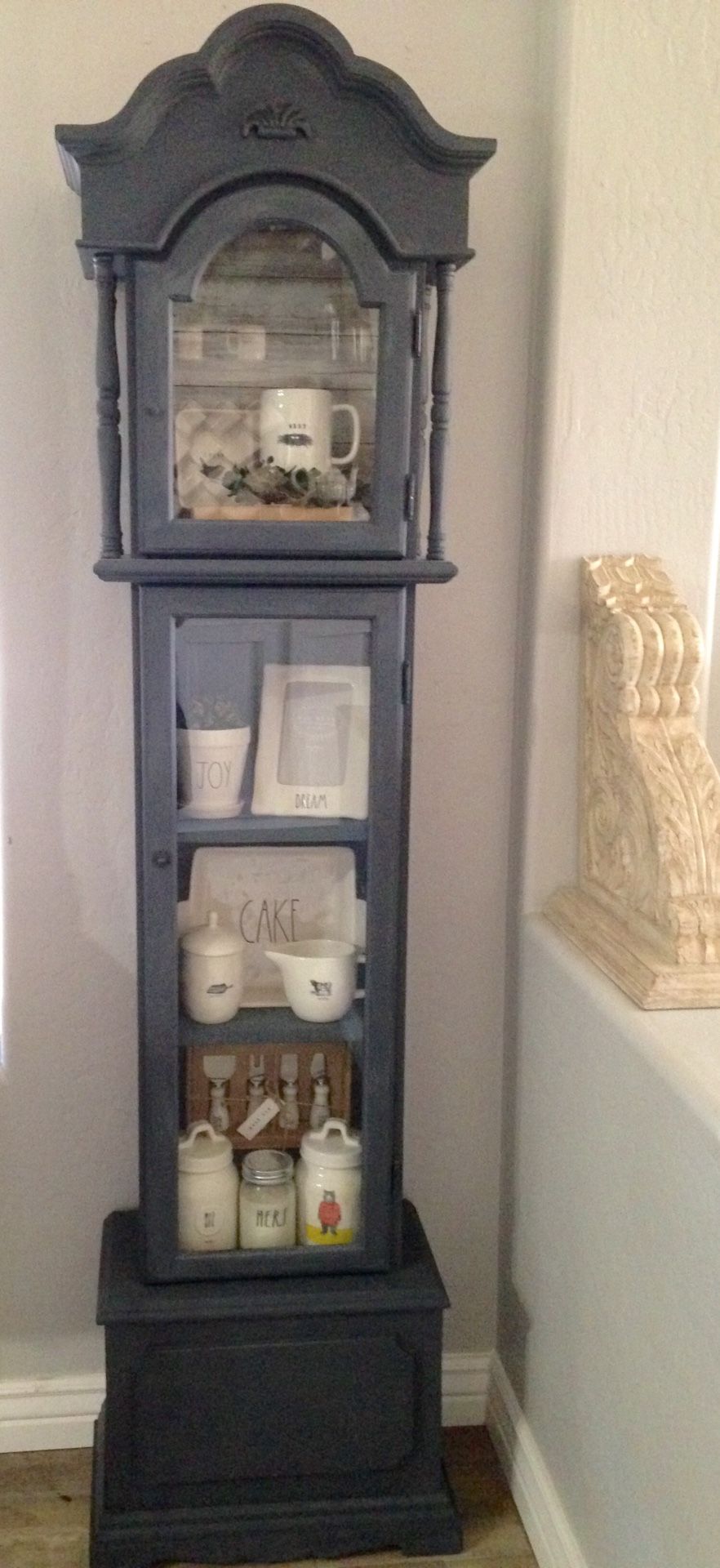 Custom painted repurposed grandfather clock into a display case
