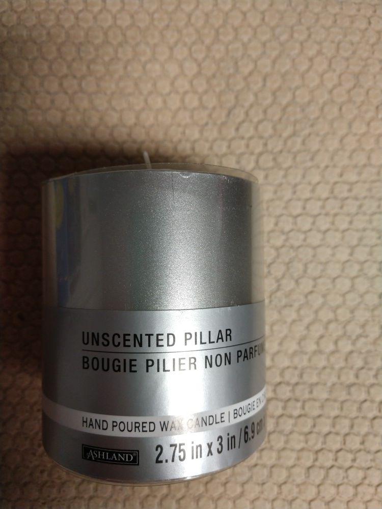 Candle...silver ...new