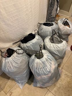 7 bags of women’s clothes, shoes, handbags